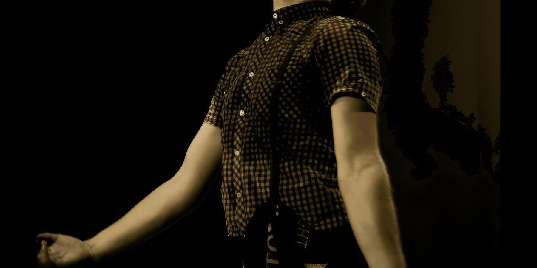 A Northern Soul dancer leaning back with arms outstretched.